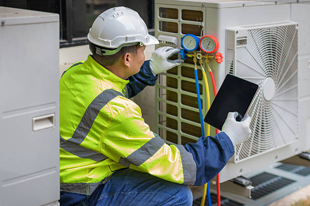 Professional Heat Pump Repair technician working in Purchase, NY